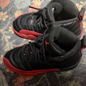 Jordan 12’s Black and Red Sneakers